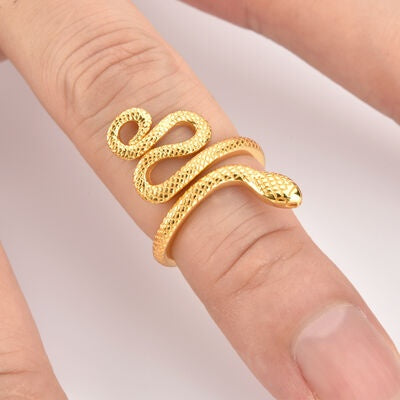 A close-up shows a 925 sterling silver snake-shape ring with 18K gold plating wrapping the finger in a textured, sculptural serpentine silhouette.