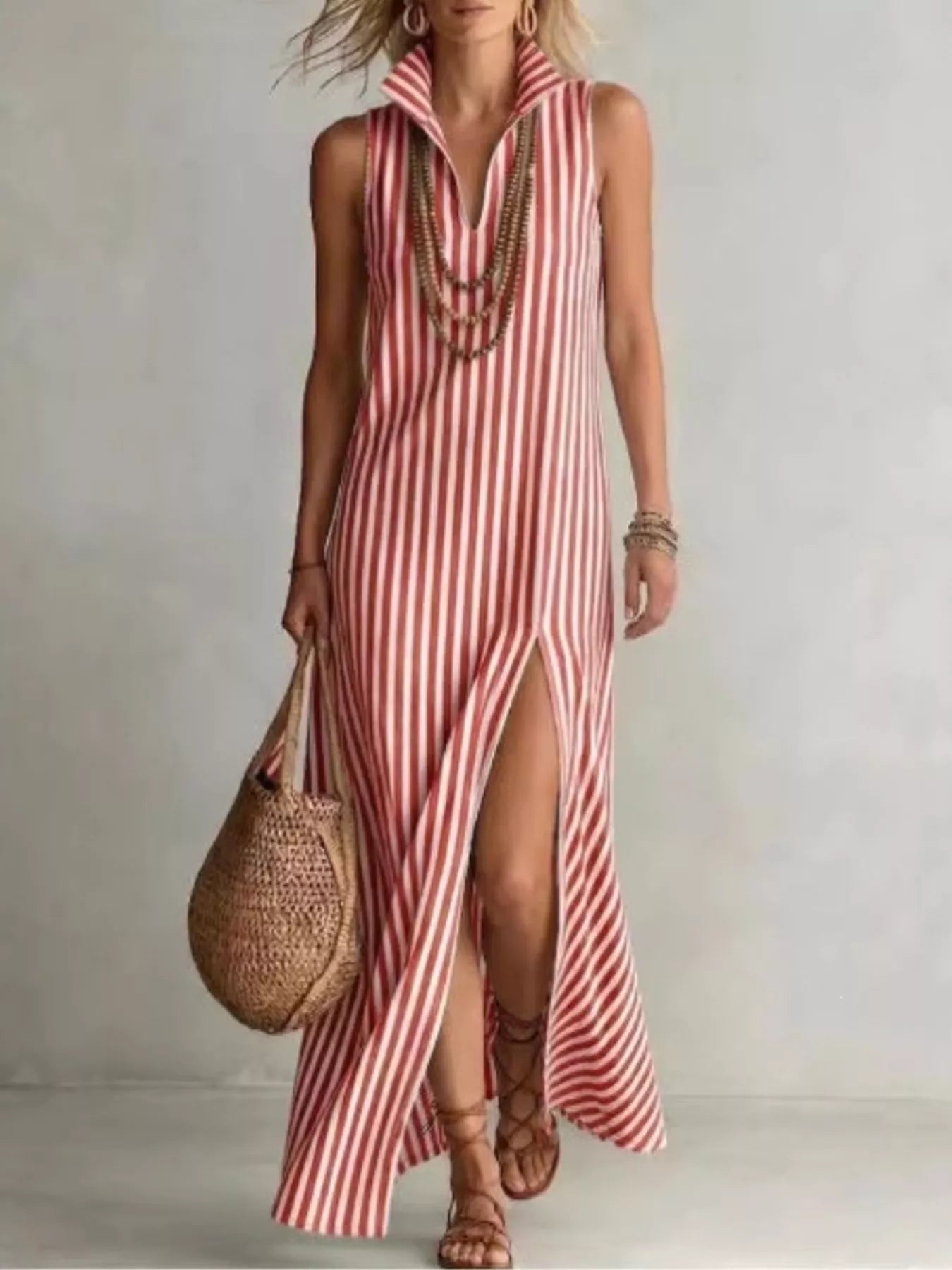 Plus-size striped polyester maxi dress with sleeveless collared design and high front slit