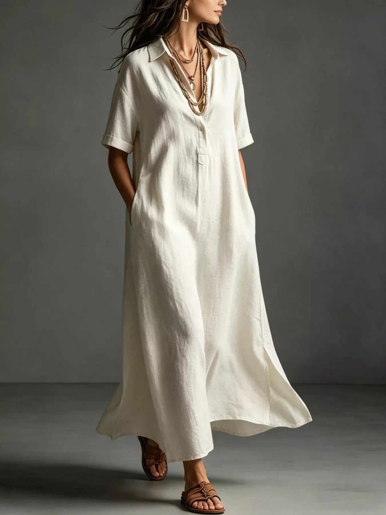 Relaxed plus-size cream midi shirt dress with collar, pockets, button front, and short sleeves