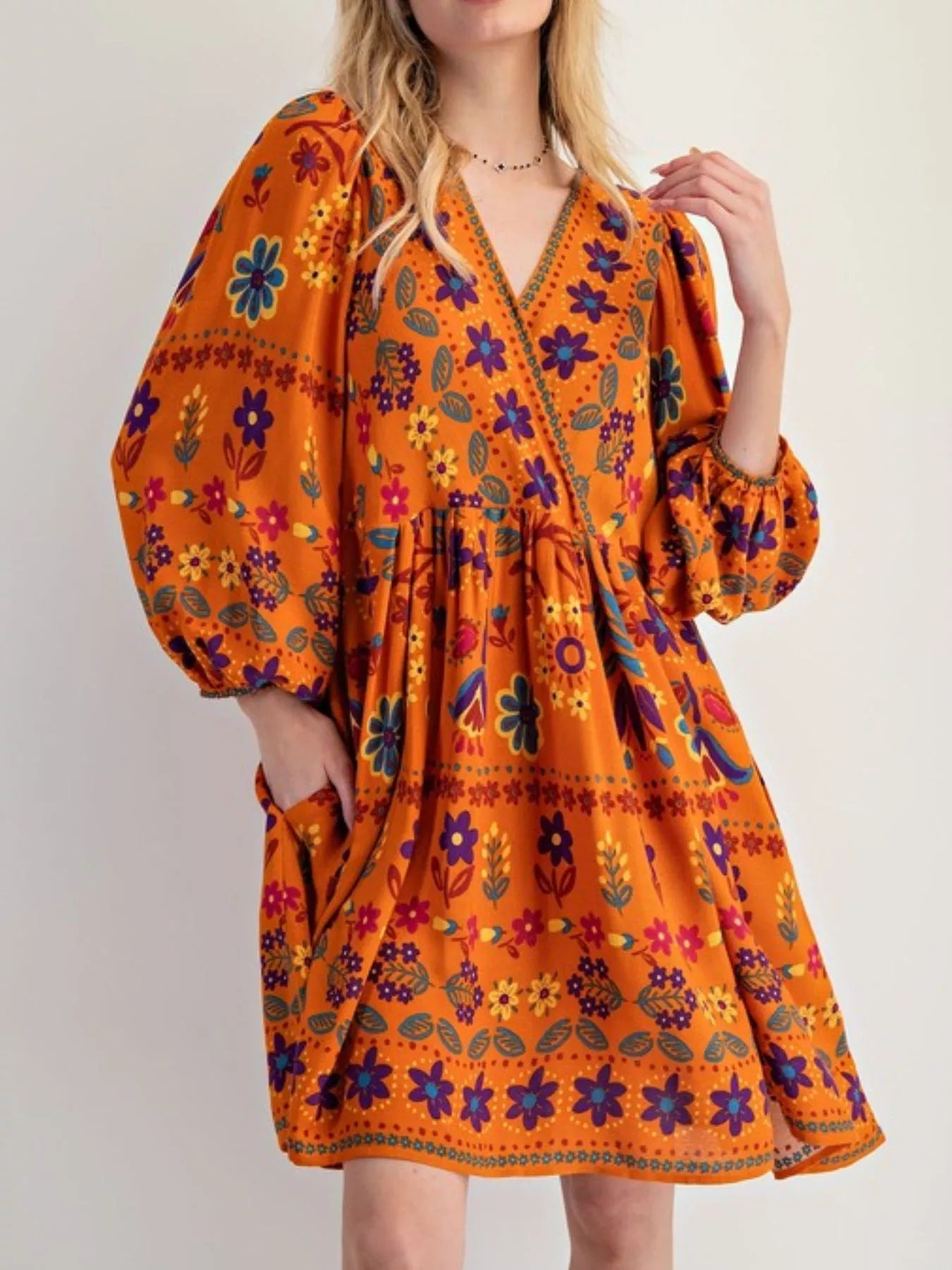 Bohemian Floral Print Long Sleeve Mini Dress with Pockets.
