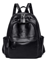 Medium black PU leather backpack bag with a structured silhouette, dual shoulder straps, multiple zippered compartments, and practical side pockets.
