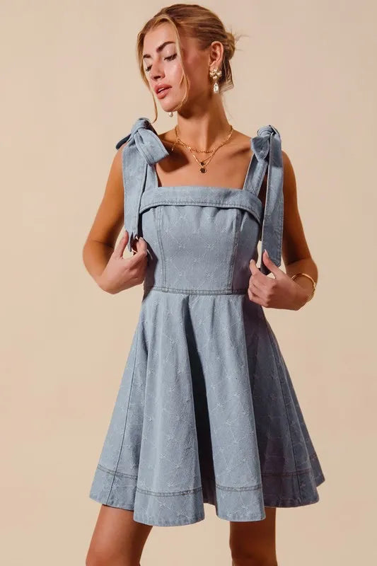 A-Line Fit and Flare Diamond Bow Ribbon Denim Dress with Tied Bow.