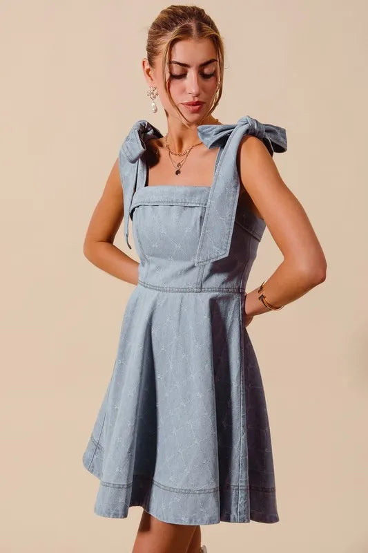 A-Line Fit and Flare Diamond Bow Ribbon Denim Dress with Tied Bow.