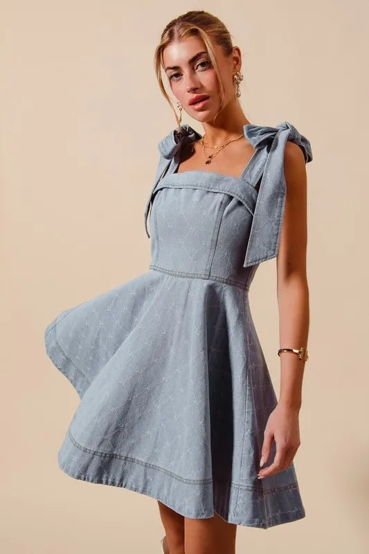 A-Line Fit and Flare Diamond Bow Ribbon Denim Dress with Tied Bow.