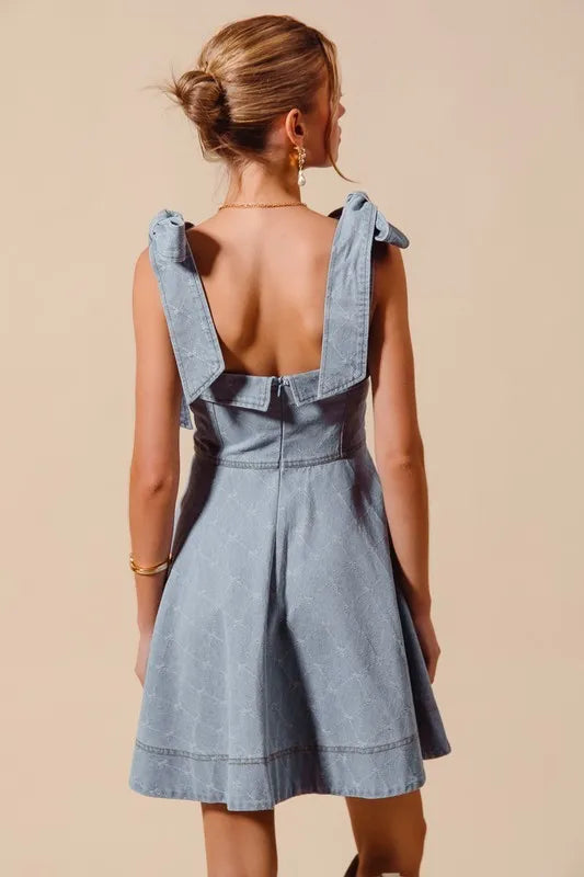 A-Line Fit and Flare Diamond Bow Ribbon Denim Dress with Tied Bow.