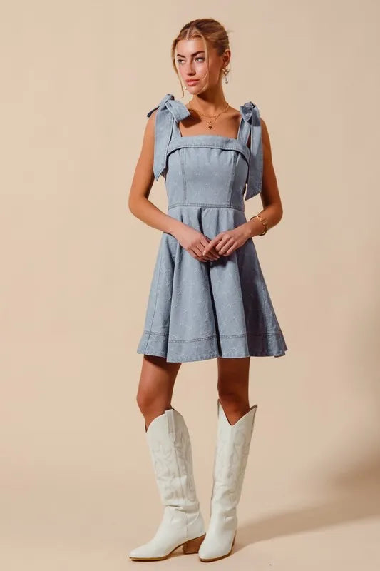 A-Line Fit and Flare Diamond Bow Ribbon Denim Dress with Tied Bow.