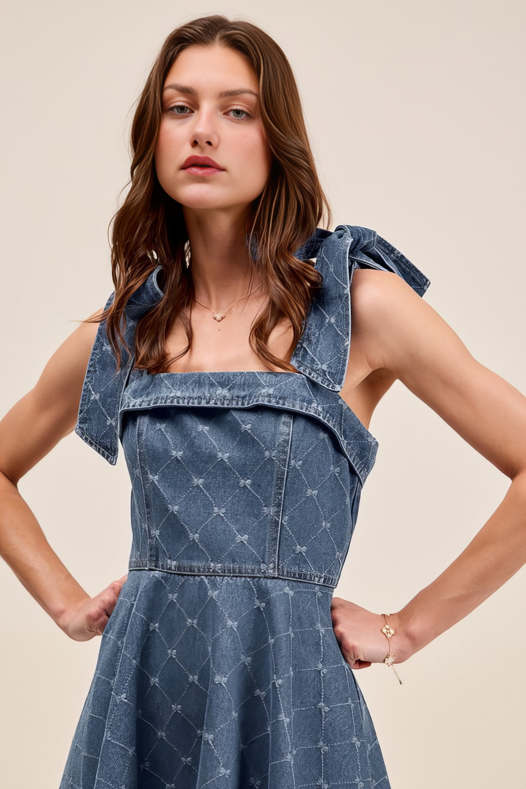A-Line Fit and Flare Diamond Bow Ribbon Denim Dress with Tied Bow.