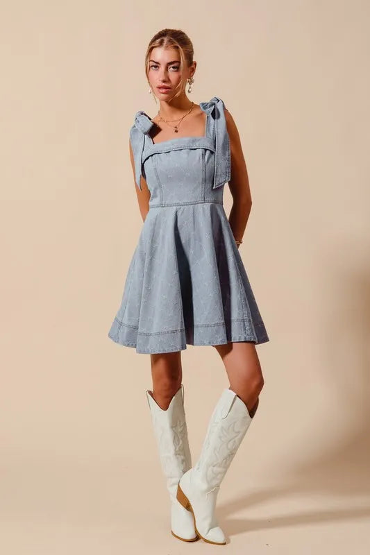 A-Line Fit and Flare Diamond Bow Ribbon Denim Dress with Tied Bow.
