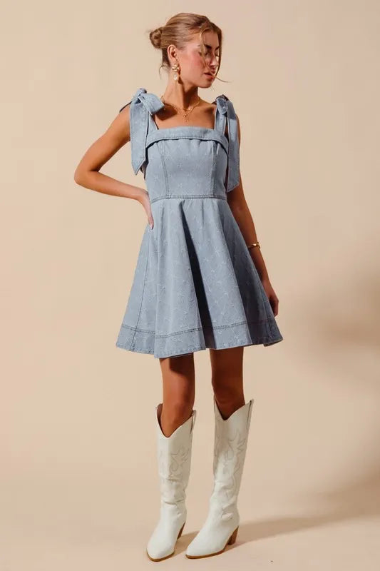 A-Line Fit and Flare Diamond Bow Ribbon Denim Dress with Tied Bow.