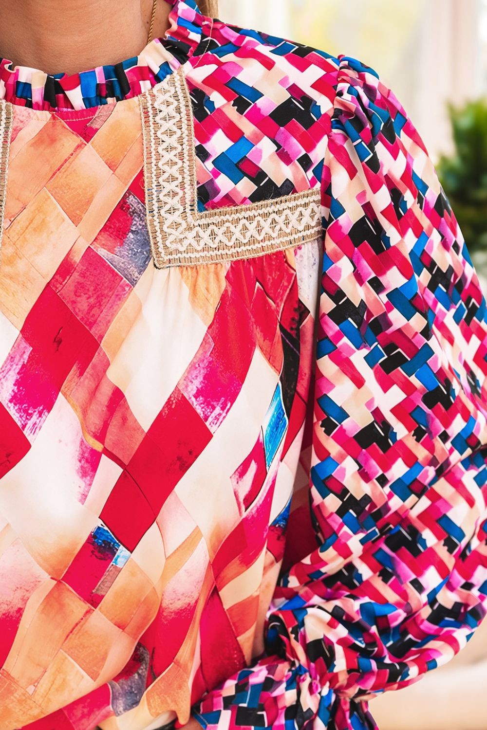 Abstract geometric pattern flounce sleeve blouse.