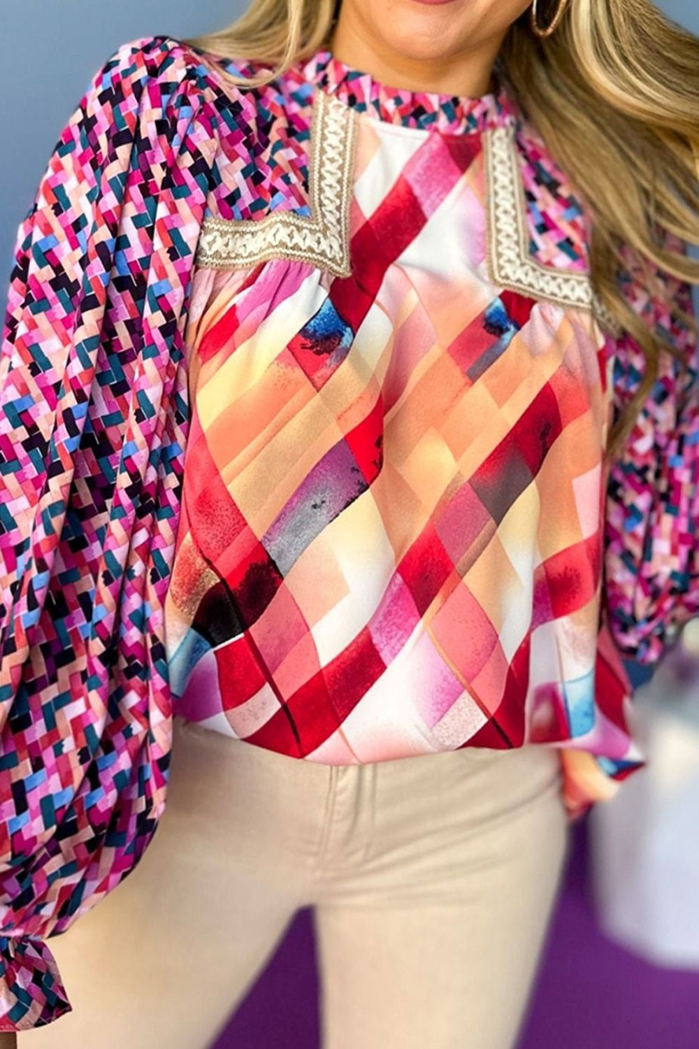 Abstract geometric pattern flounce sleeve blouse.