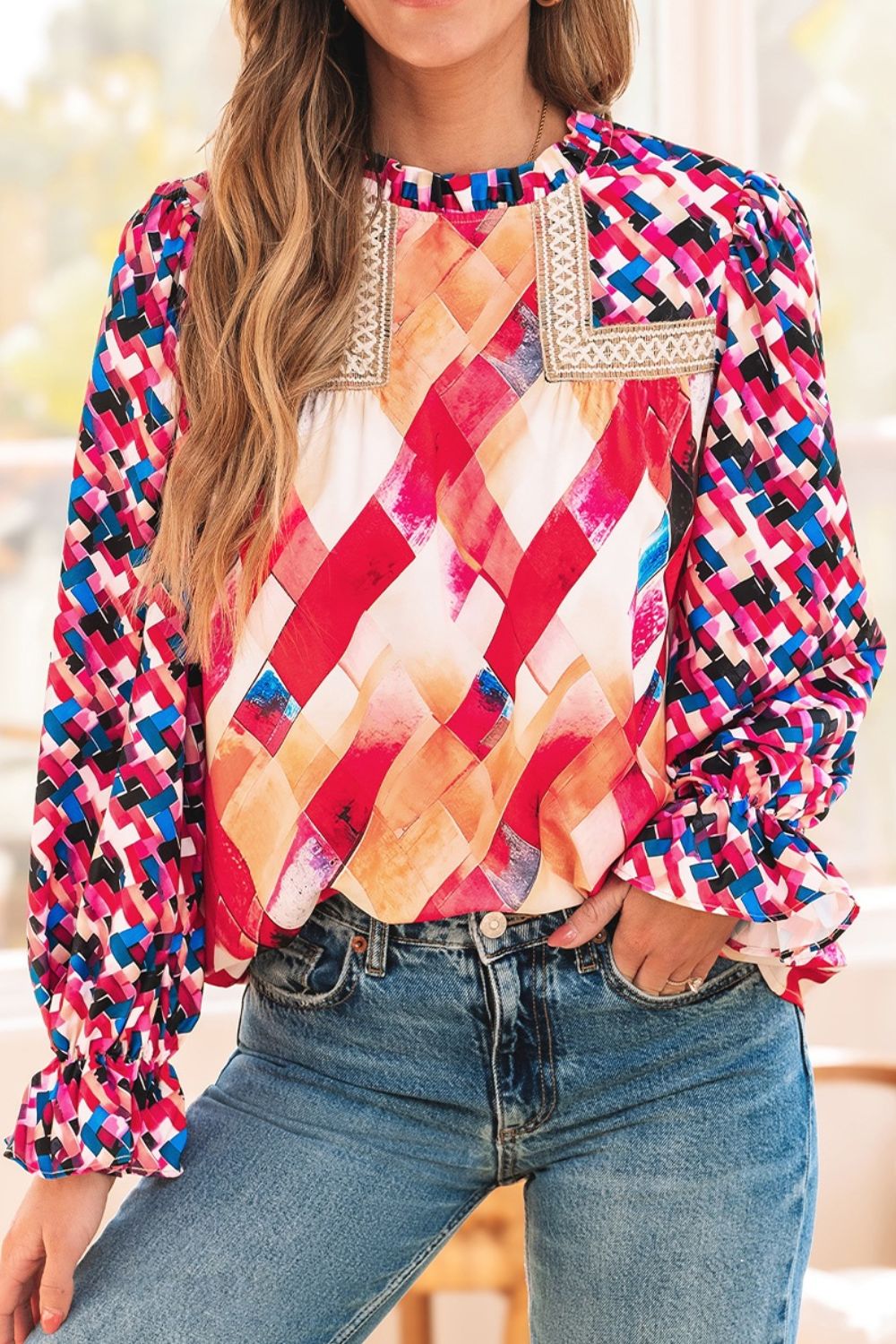 Abstract geometric pattern flounce sleeve blouse.