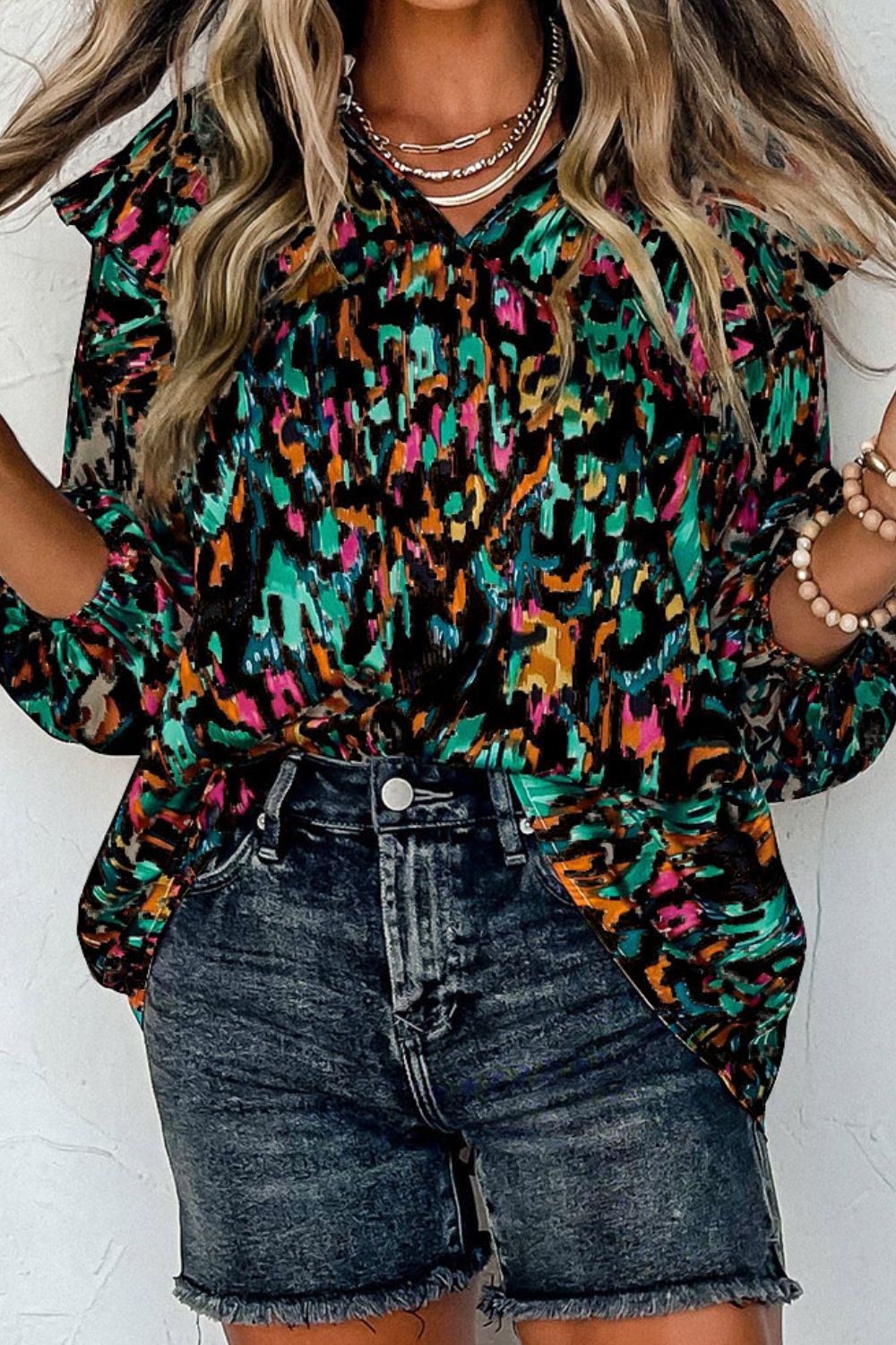 Abstract print 3/4 sleeve ruffle blouse.