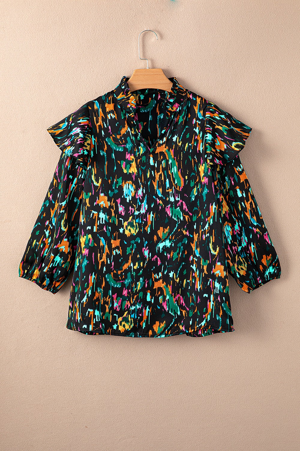 Abstract print 3/4 sleeve ruffle blouse.