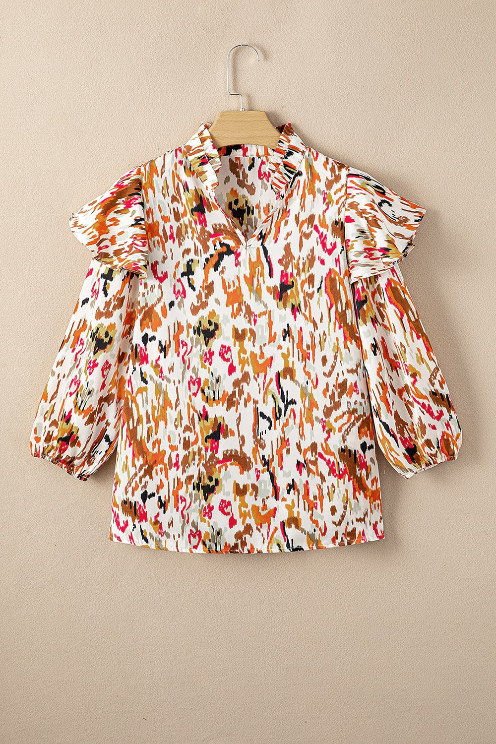 Abstract print 3/4 sleeve ruffle blouse.