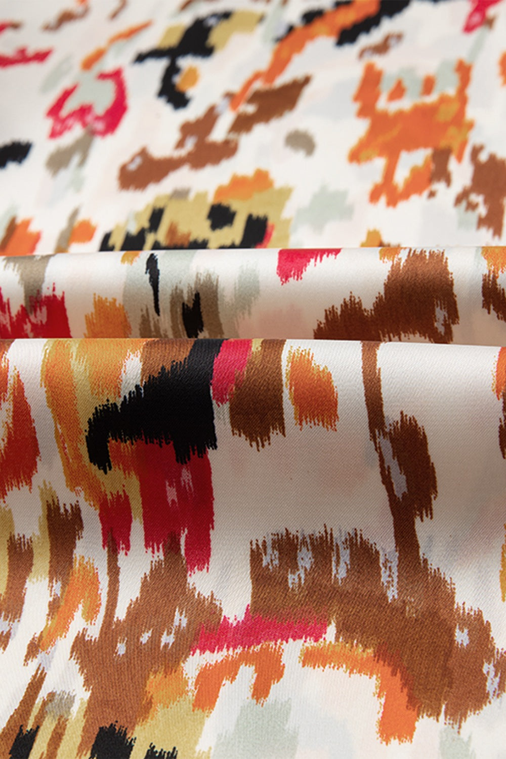 Abstract print 3/4 sleeve ruffle blouse.