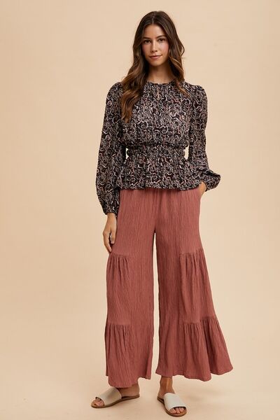 Annie Wear abstract print balloon sleeve peplum blouse.