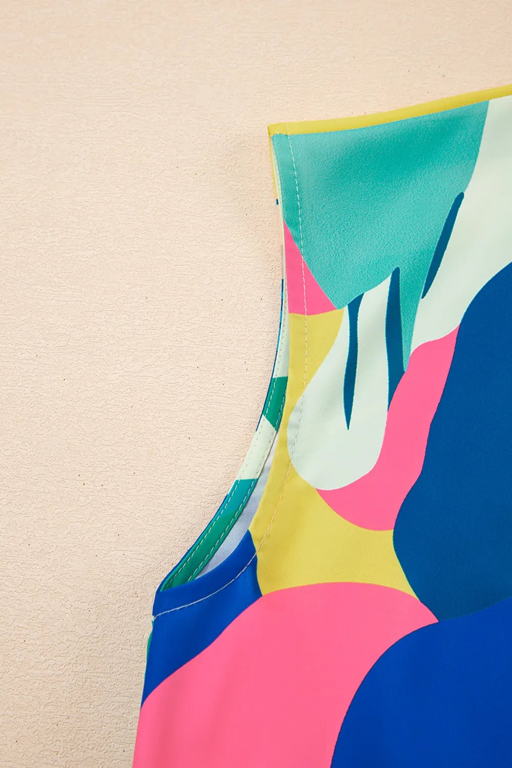 Abstract Print Cap Sleeve Pocketed Mini Dress with Tiered Skirt.