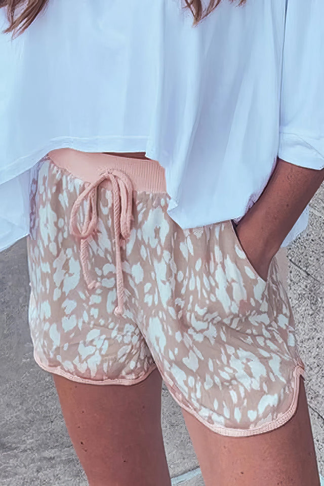 Women's abstract print casual shorts with drawstring waist.