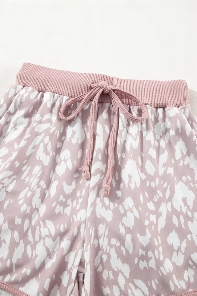 Women's abstract print casual shorts with drawstring waist.