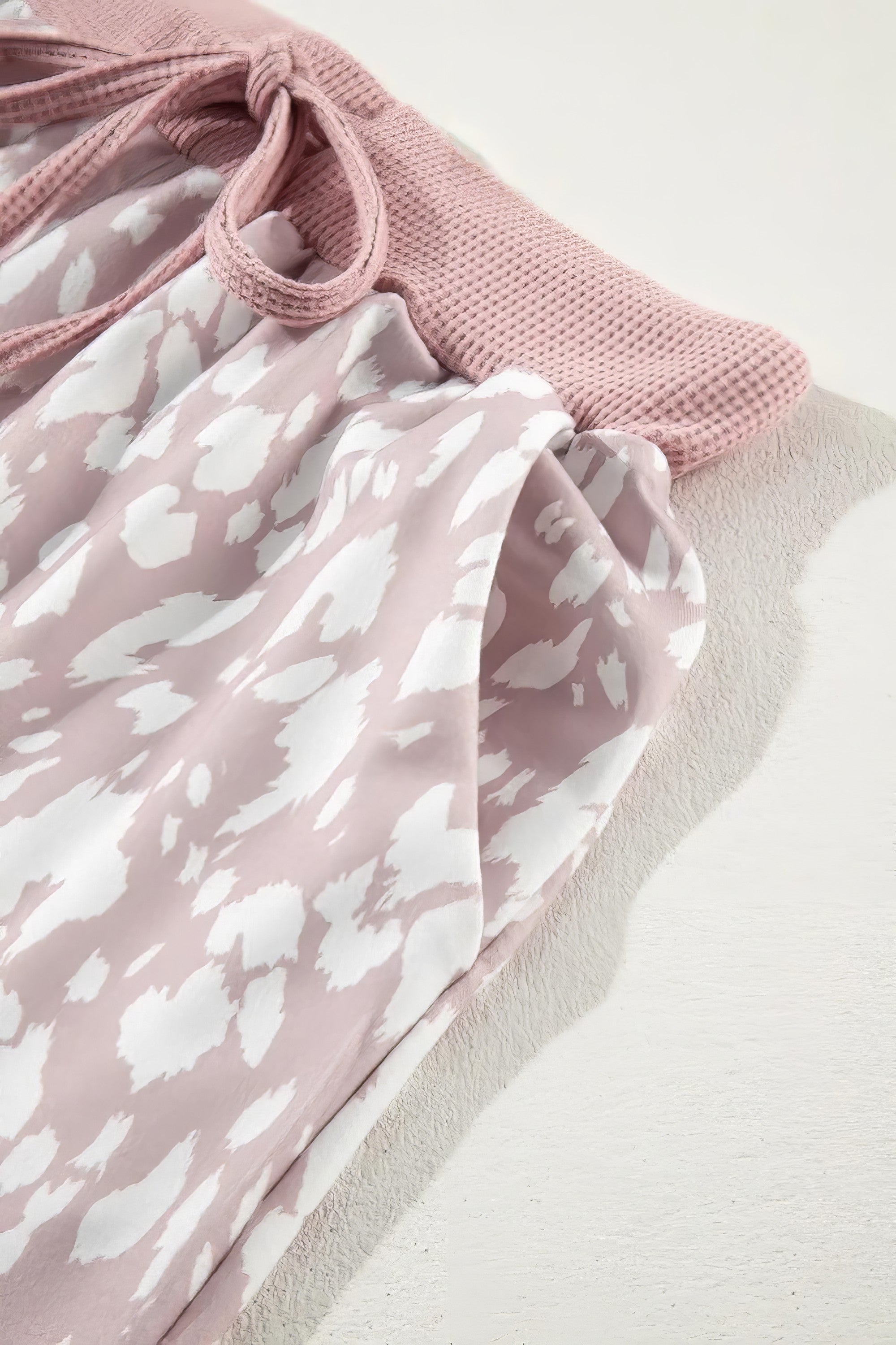 Women's abstract print casual shorts with drawstring waist.