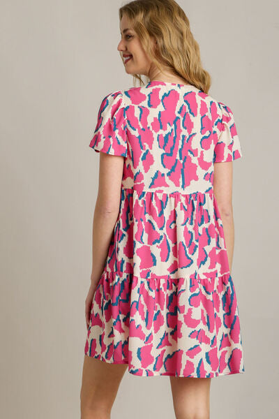 Umgee Plus Size Abstract Print Pleat Detail Short Sleeve V-Neck Tiered Dress.