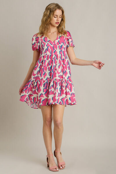 Umgee Plus Size Abstract Print Pleat Detail Short Sleeve V-Neck Tiered Dress.