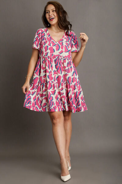 Umgee Plus Size Abstract Print Pleat Detail Short Sleeve V-Neck Tiered Dress.
