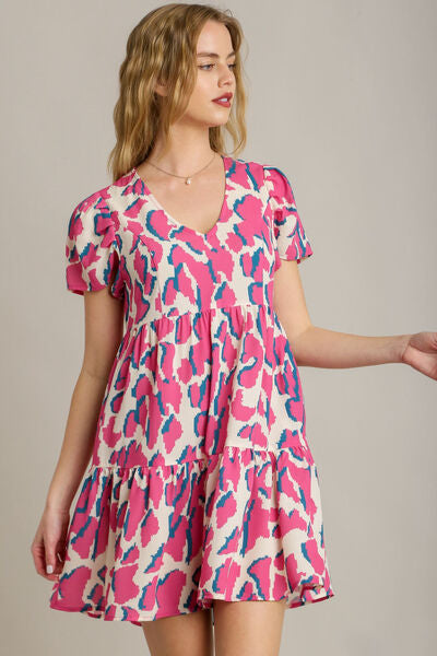Umgee Plus Size Abstract Print Pleat Detail Short Sleeve V-Neck Tiered Dress.