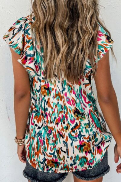 Abstract print ruffle sleeve blouse.