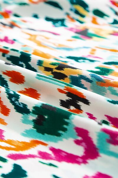 Abstract print ruffle sleeve blouse.