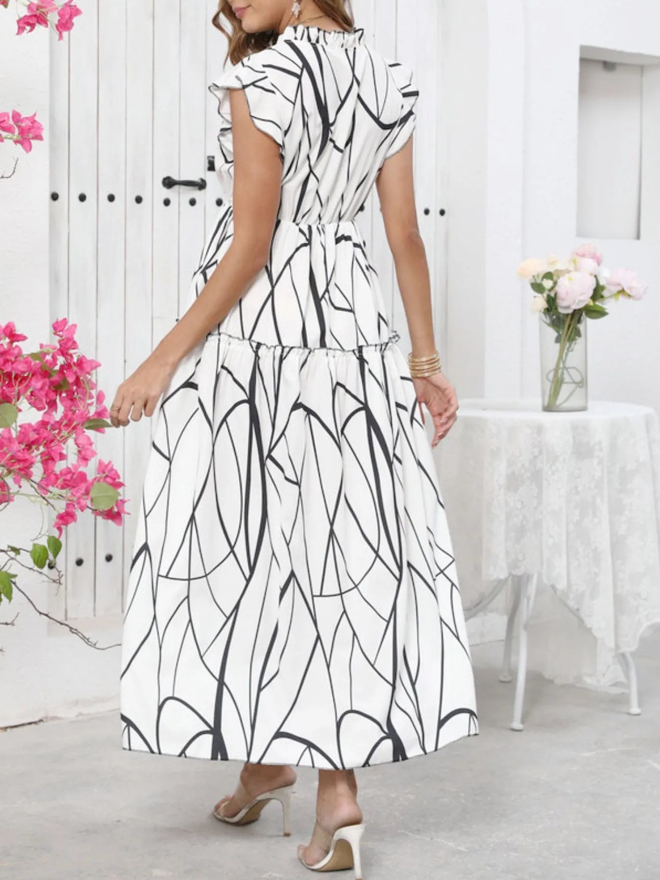 Abstract Print Ruffle Sleeve V-Neck Midi Dress with Frill and Ruched Details.
