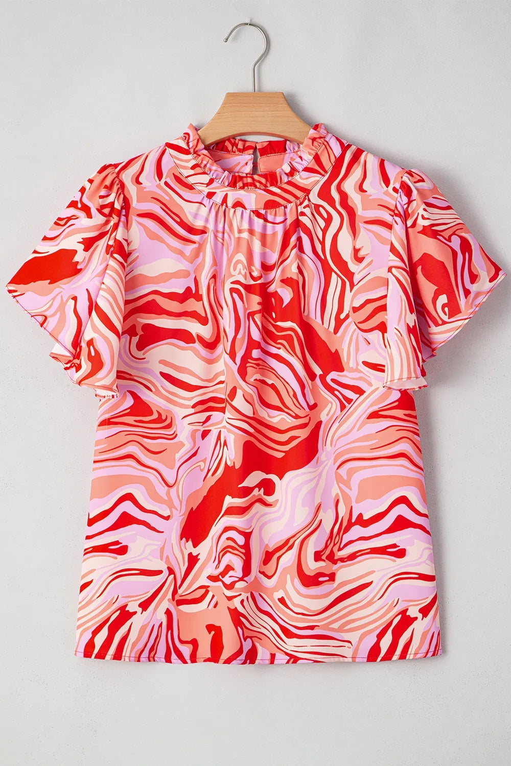 Abstract Print Ruffled Short Sleeve Mock Neck Blouse.