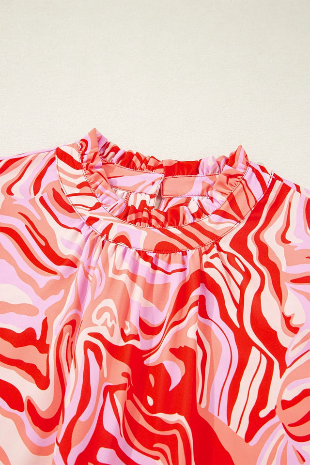 Abstract Print Ruffled Short Sleeve Mock Neck Blouse.