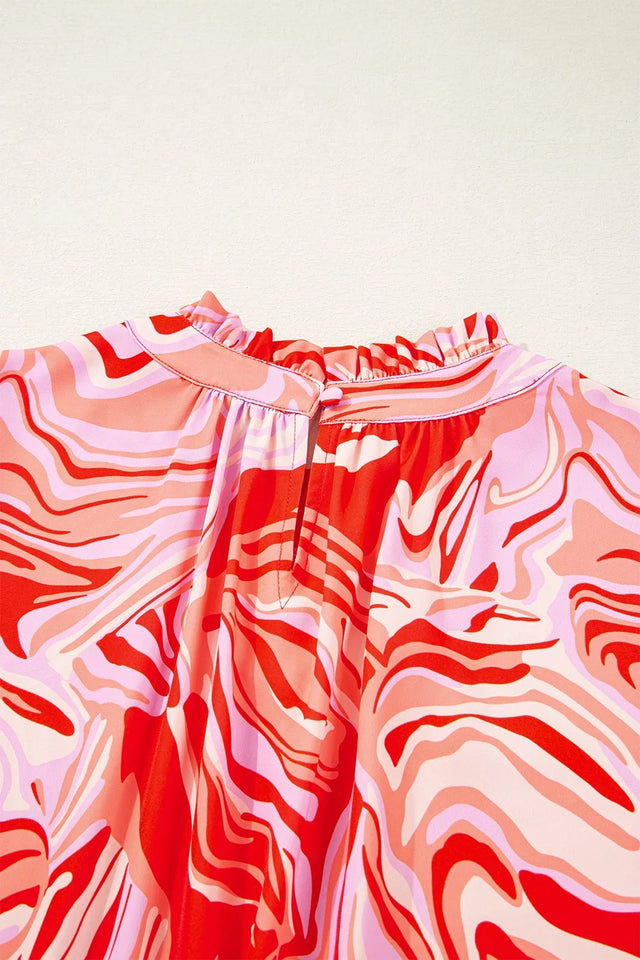 Abstract Print Ruffled Short Sleeve Mock Neck Blouse.