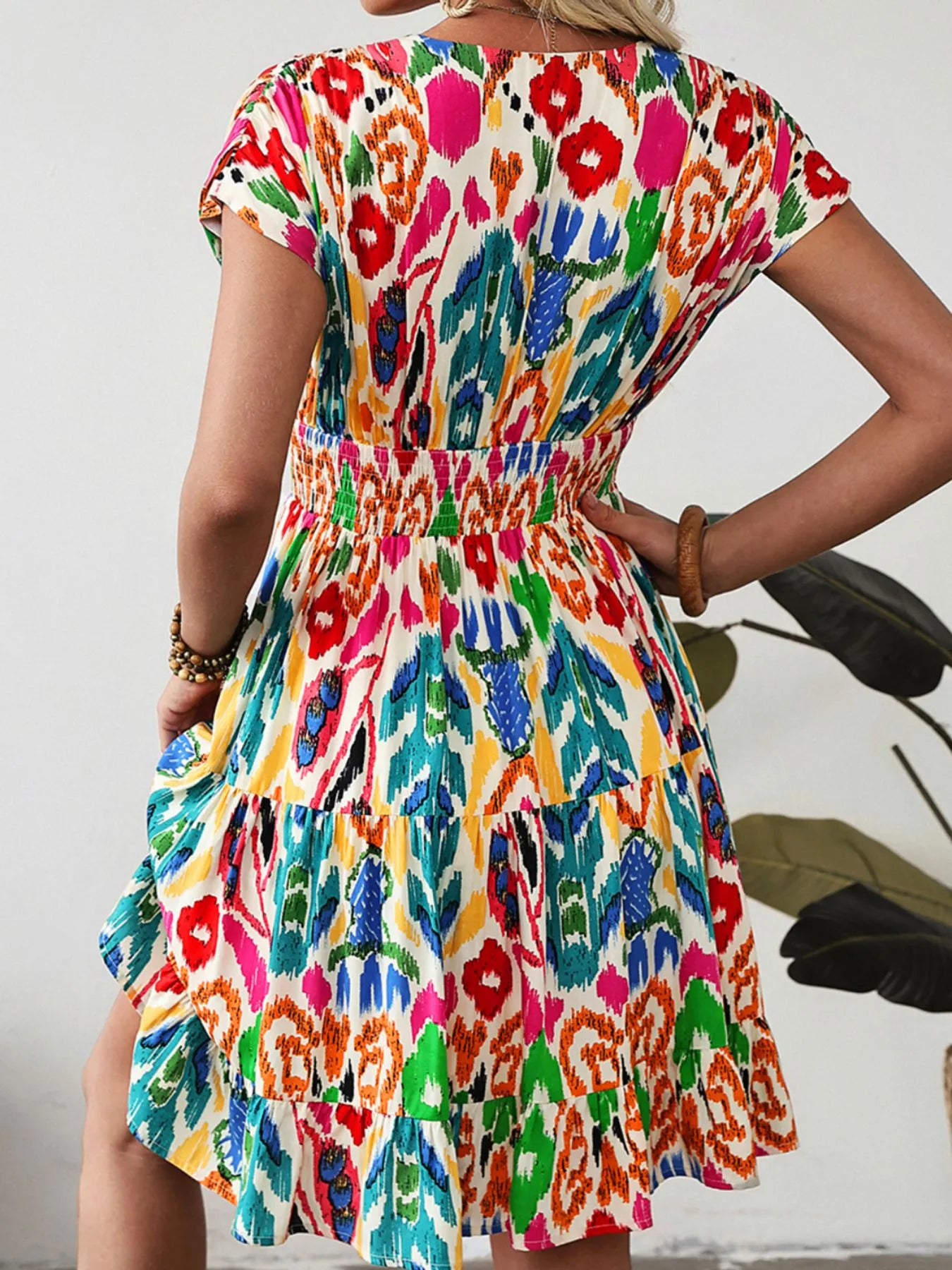 Abstract Print V Neck Dolman Sleeve Ruffle Tiered Mini Dress.