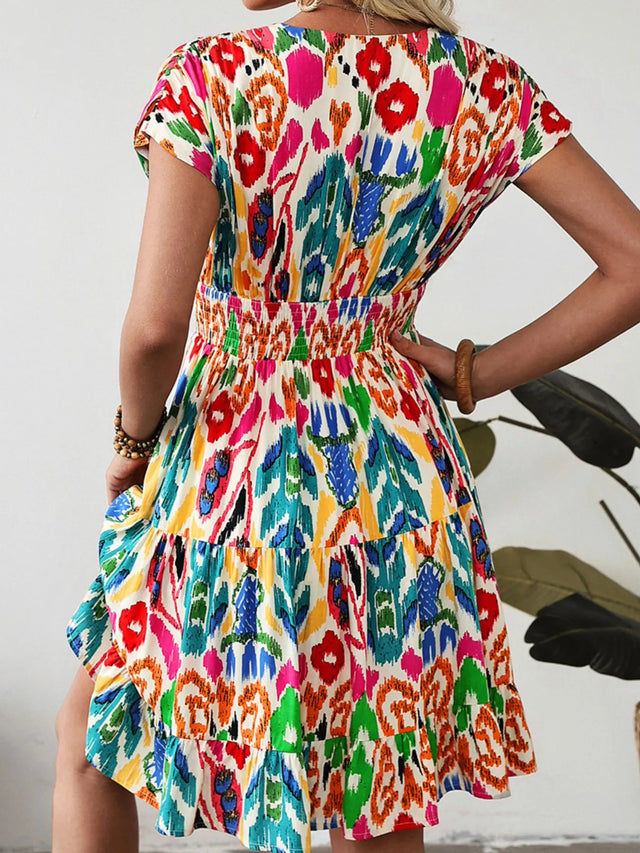 Abstract Print V Neck Dolman Sleeve Ruffle Tiered Mini Dress.