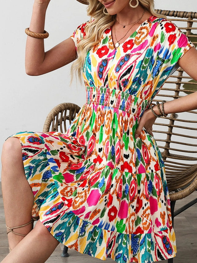 Abstract Print V Neck Dolman Sleeve Ruffle Tiered Mini Dress.