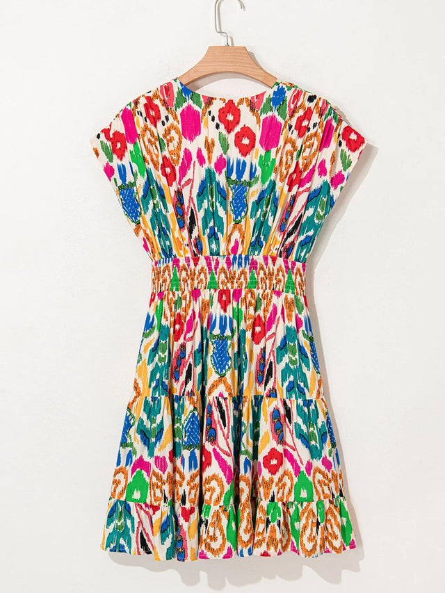 Abstract Print V Neck Dolman Sleeve Ruffle Tiered Mini Dress.