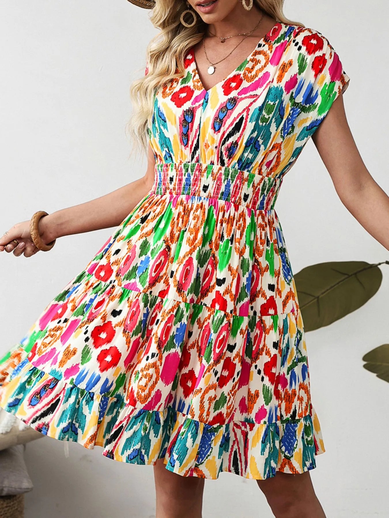 Abstract Print V Neck Dolman Sleeve Ruffle Tiered Mini Dress.