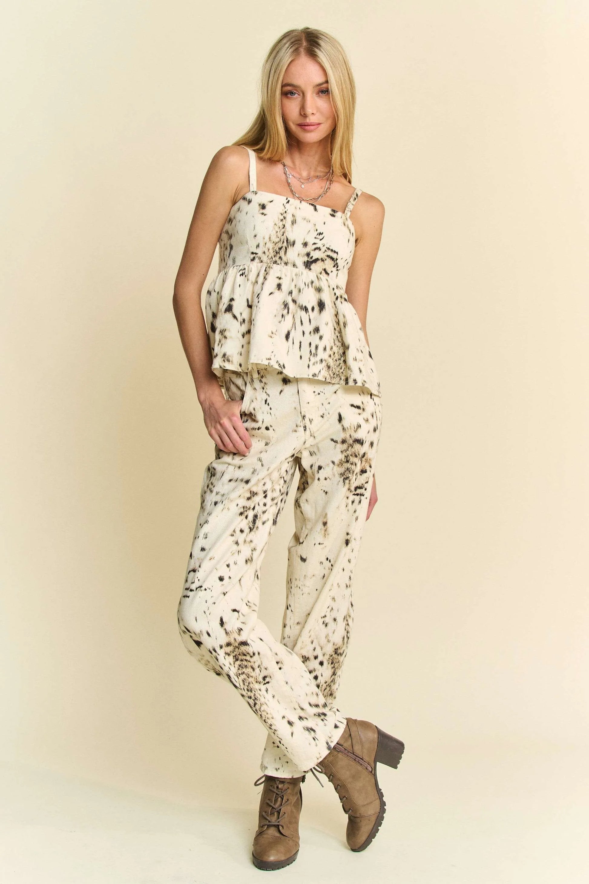 Abstract tie-dye dot lace detail barrel pants with pockets on a cream background.