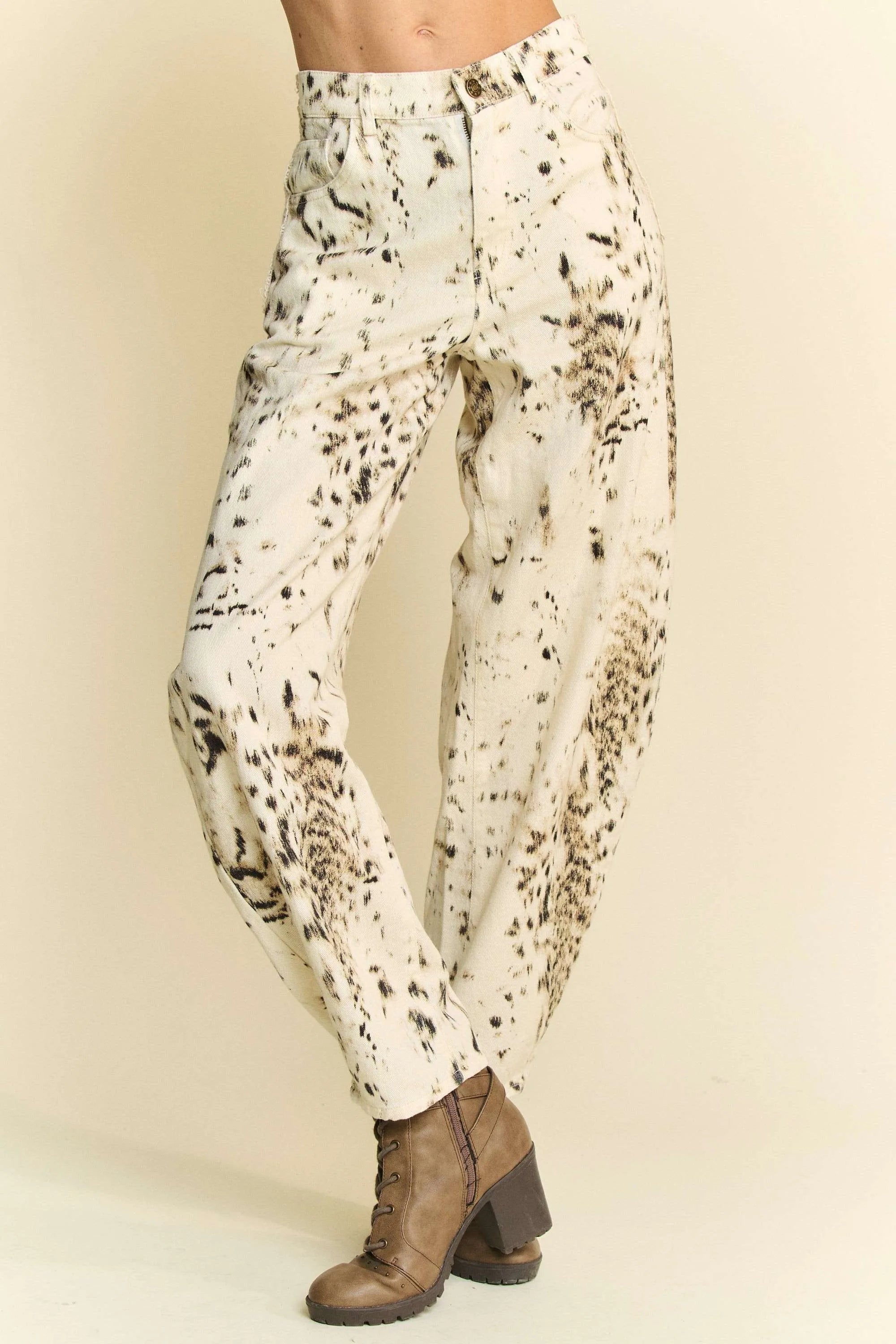 Abstract tie-dye dot lace detail barrel pants with pockets on a cream background.