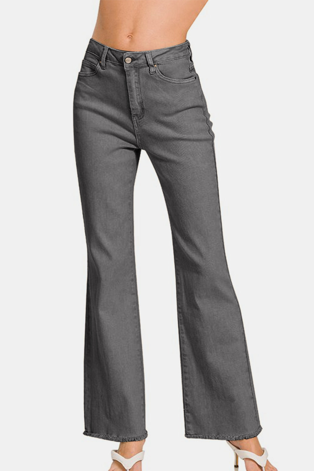 Acid washed frayed hem bootcut jeans with pockets and slight stretch.