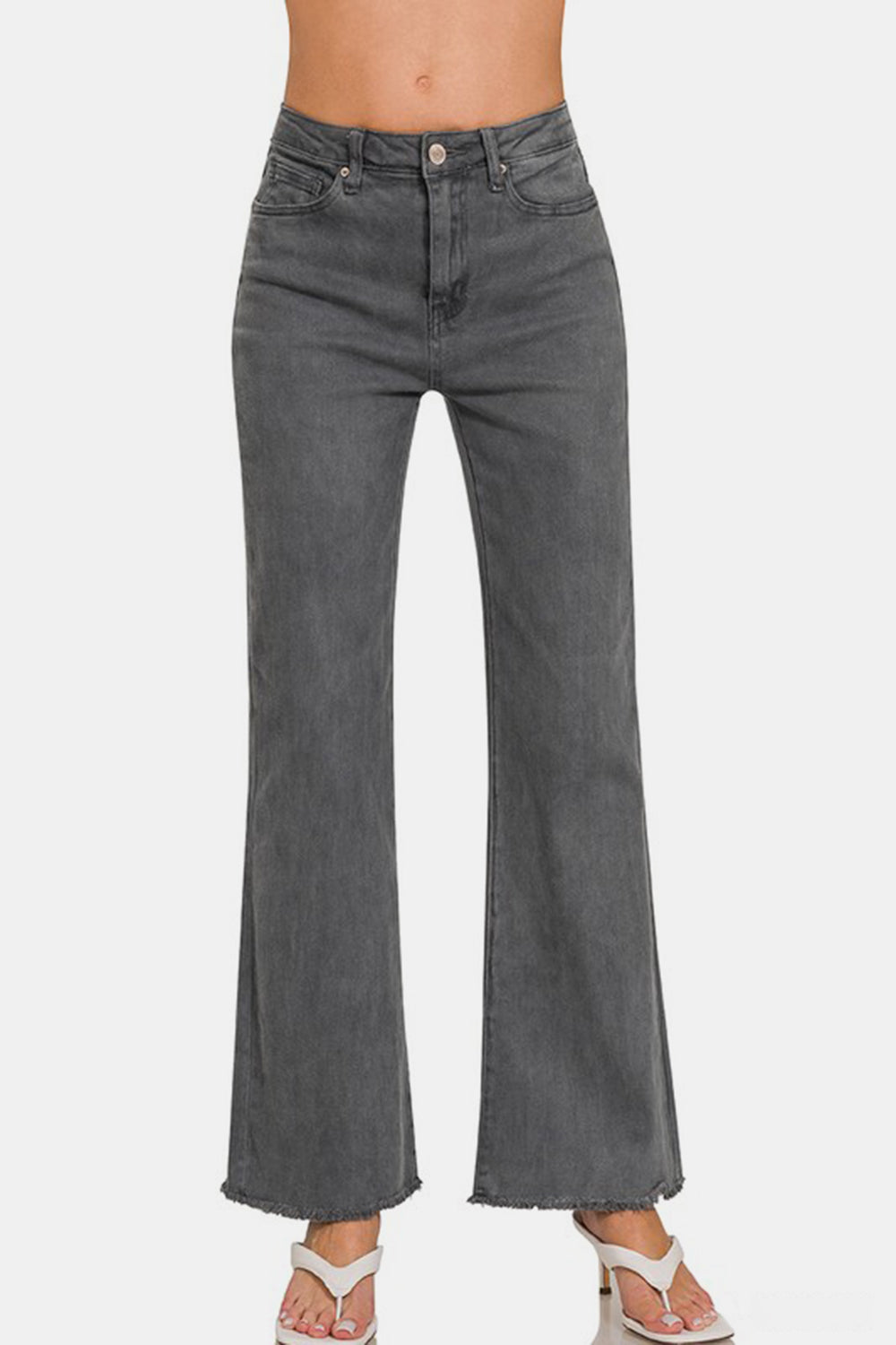 Acid washed frayed hem bootcut jeans with pockets and slight stretch.