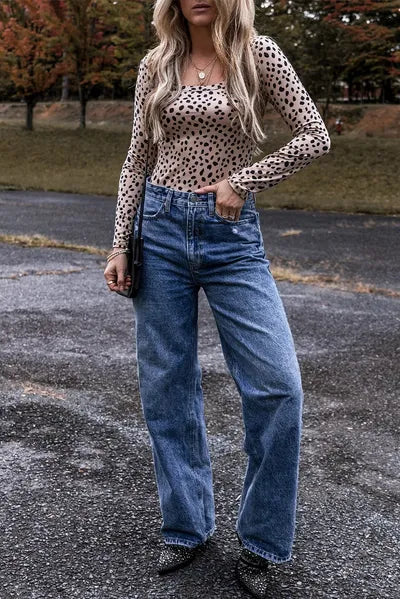 Animal print scoop neck long sleeve bodysuit.