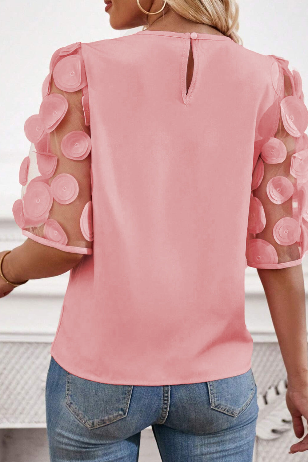 Applique round neck half sleeve blouse.