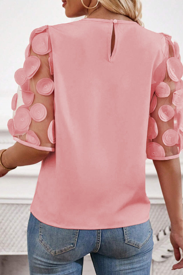 Applique round neck half sleeve blouse.