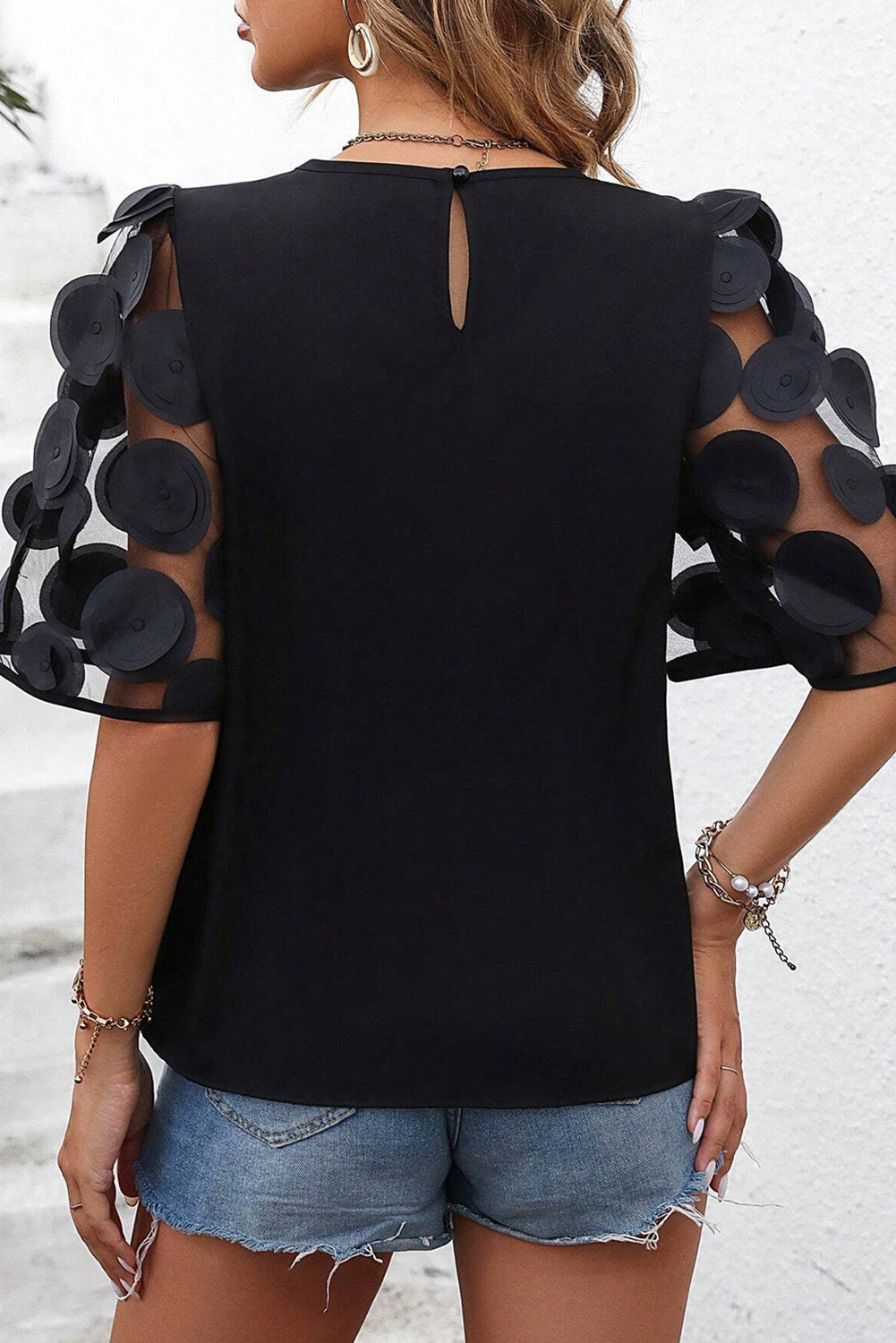 Applique round neck half sleeve blouse.