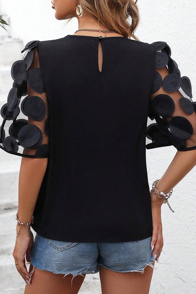 Applique round neck half sleeve blouse.
