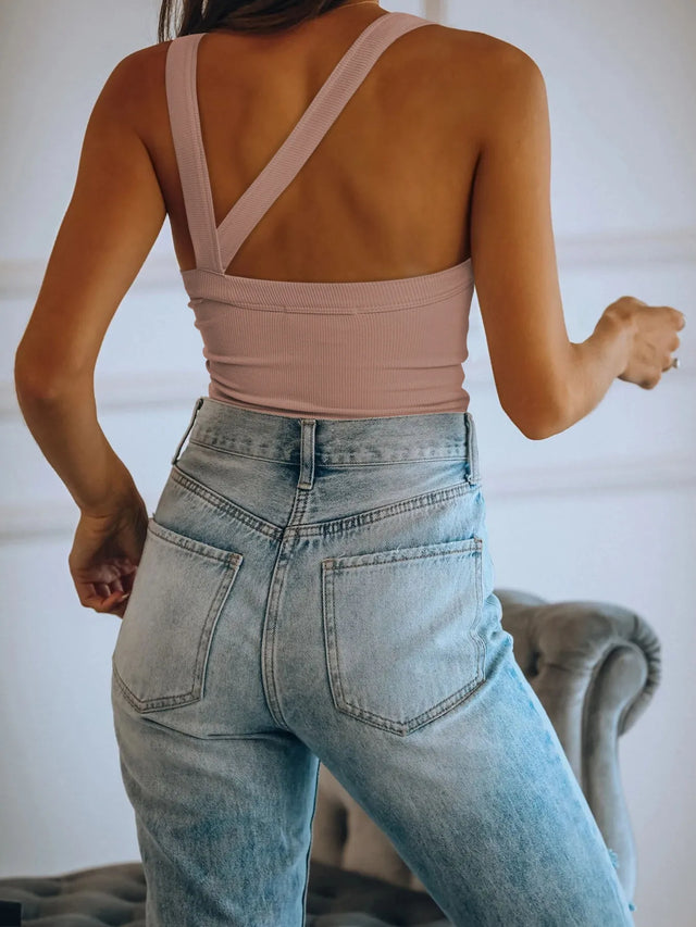 Asymmetrical back ribbed crop tank top.
